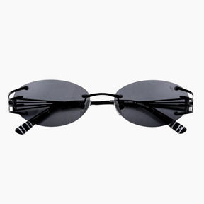 Black sunglasses with thin frames on a white background