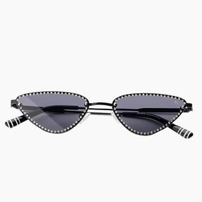 Cat-eye sunglasses with black frames and dark lenses on a white background