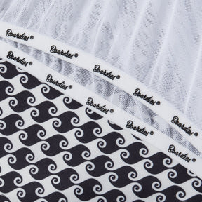 White t-shirt with black wave pattern and 'Boardies' branding