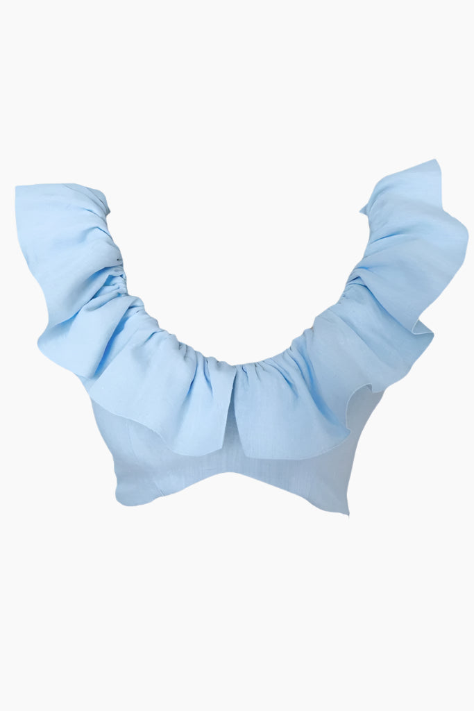 Light blue top with ruffled straps =