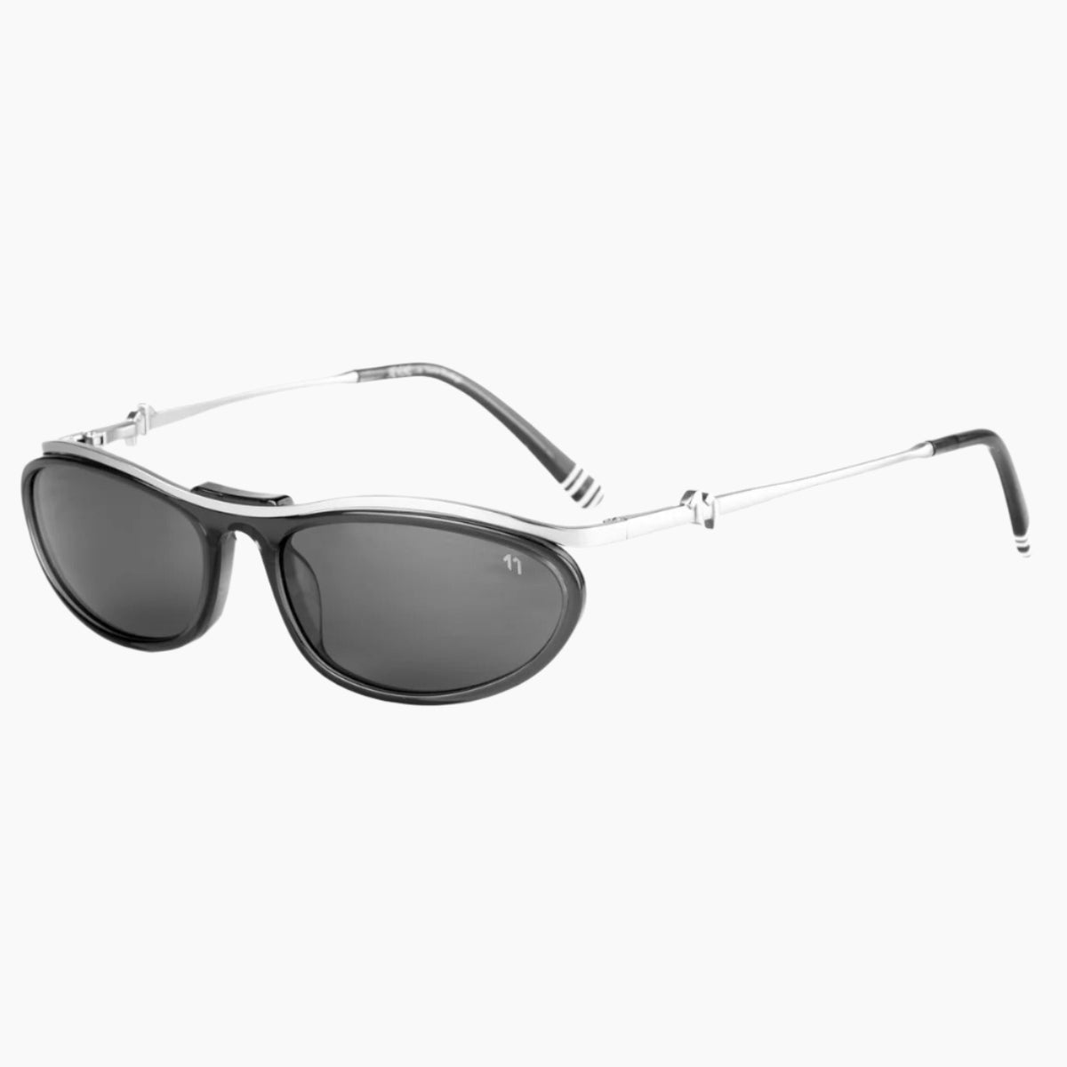 Sunglasses with dark lenses and thin metal frame on a white background