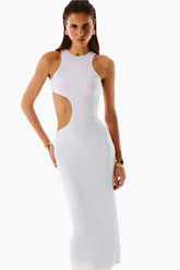 Woman wearing a white dress with cut-out design