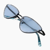 Sunglasses with decorative embellishments on a white background