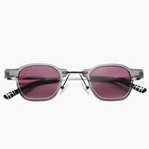 Sunglasses with dark pink lenses and striped arms 