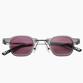 Sunglasses with dark pink lenses and striped arms 