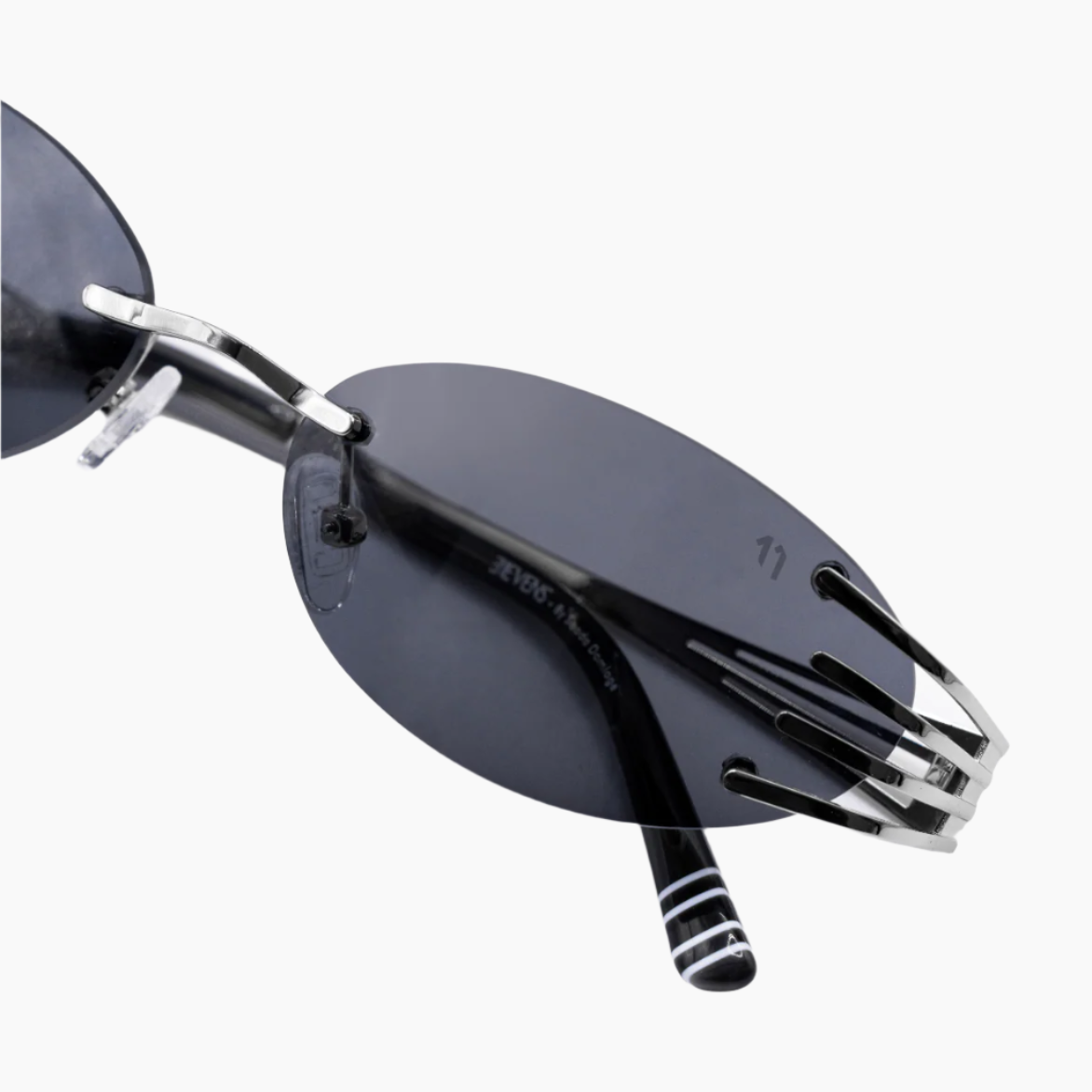 Sunglasses with black lenses and thin metal frame 