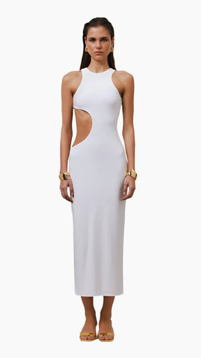 Woman wearing a white dress with cut-out design 