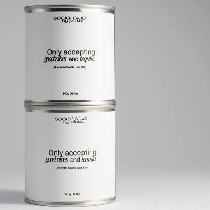 Two cans of 'social club by pluto' with text on a gray background