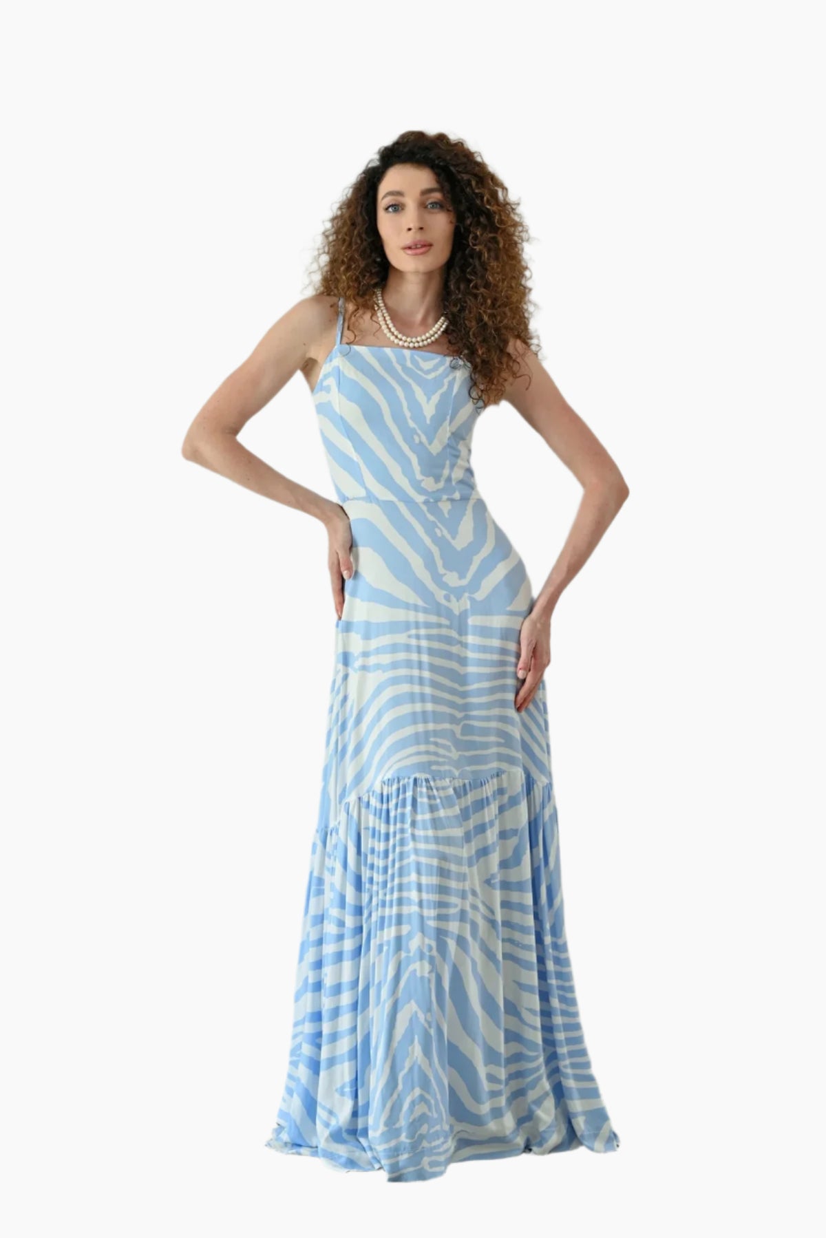 Woman wearing a blue and white striped dress