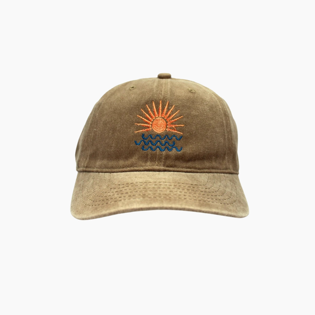 Brown cap with embroidered design 
