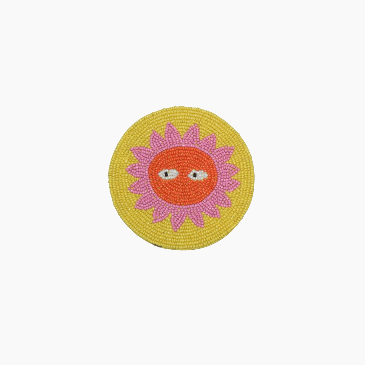 The Loteria El Sol coaster is handmade in India from beautiful, colorful beads. 