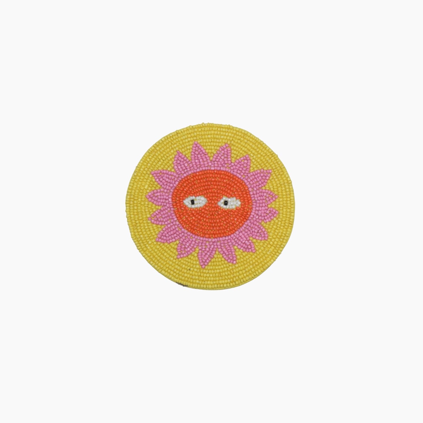 The Loteria El Sol coaster is handmade in India from beautiful, colorful beads. 