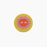 The Loteria El Sol coaster is handmade in India from beautiful, colorful beads. 