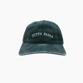 Green cap with 'Tutto Passa' text 