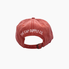 Red cap with 'The Cap Supply Co.' logo 