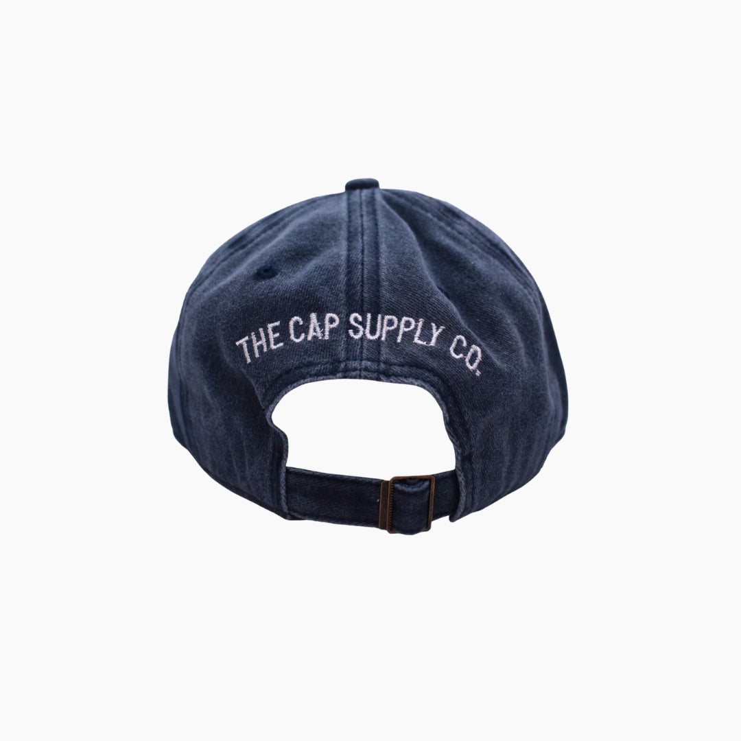 Navy blue cap with 'The Cap Supply Co.' logo 