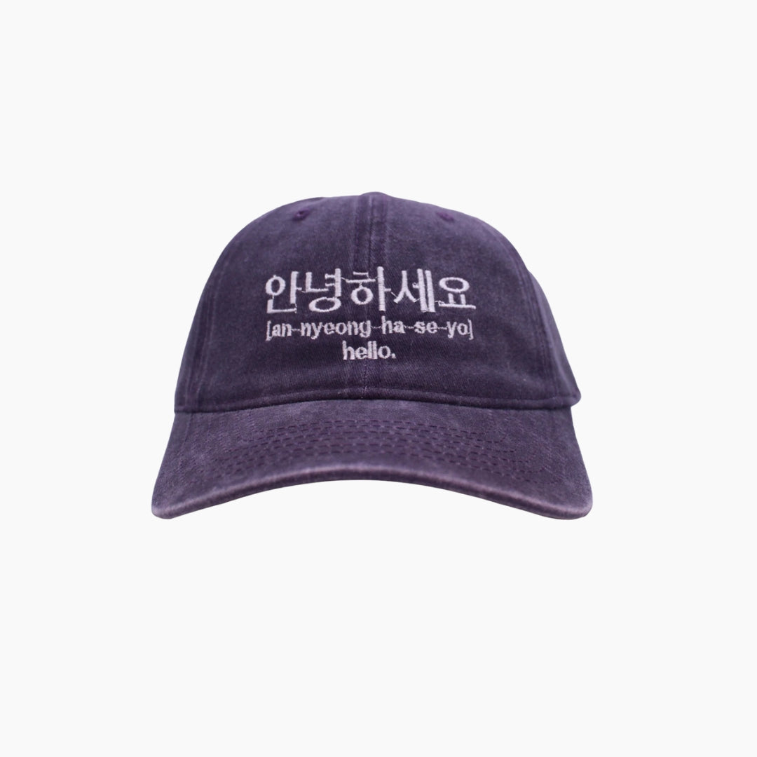 Purple cap with white text 