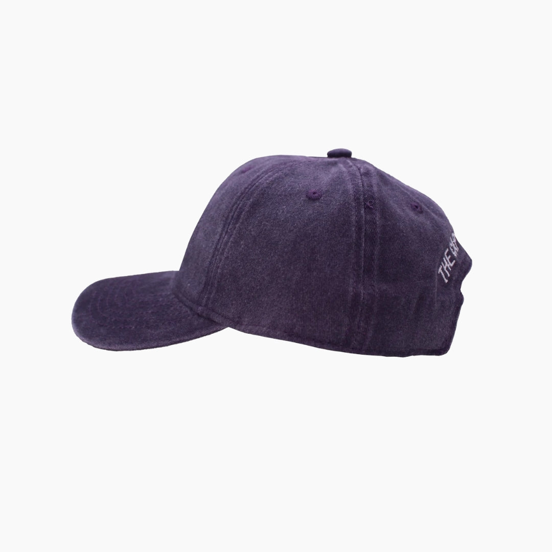 Purple baseball cap on a white background