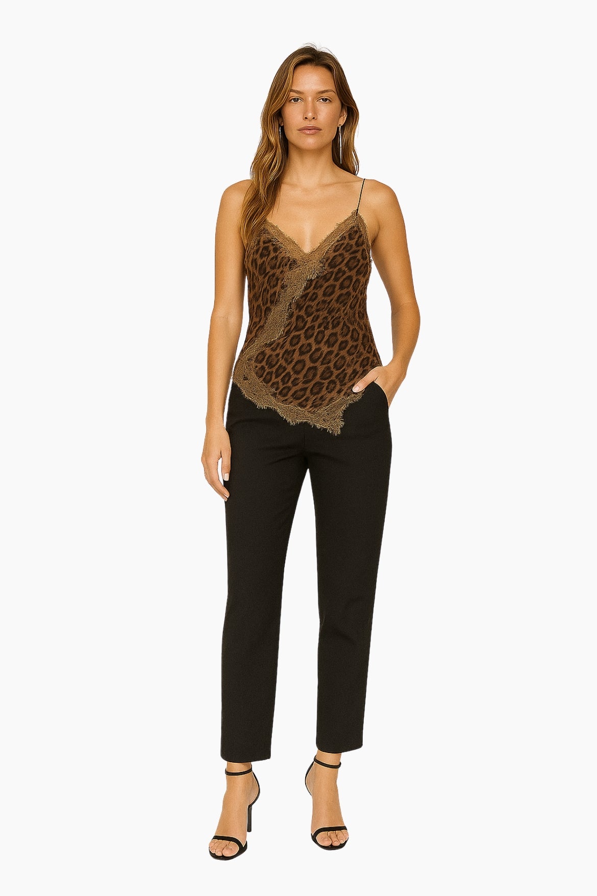 Woman wearing a leopard print top and black pants 