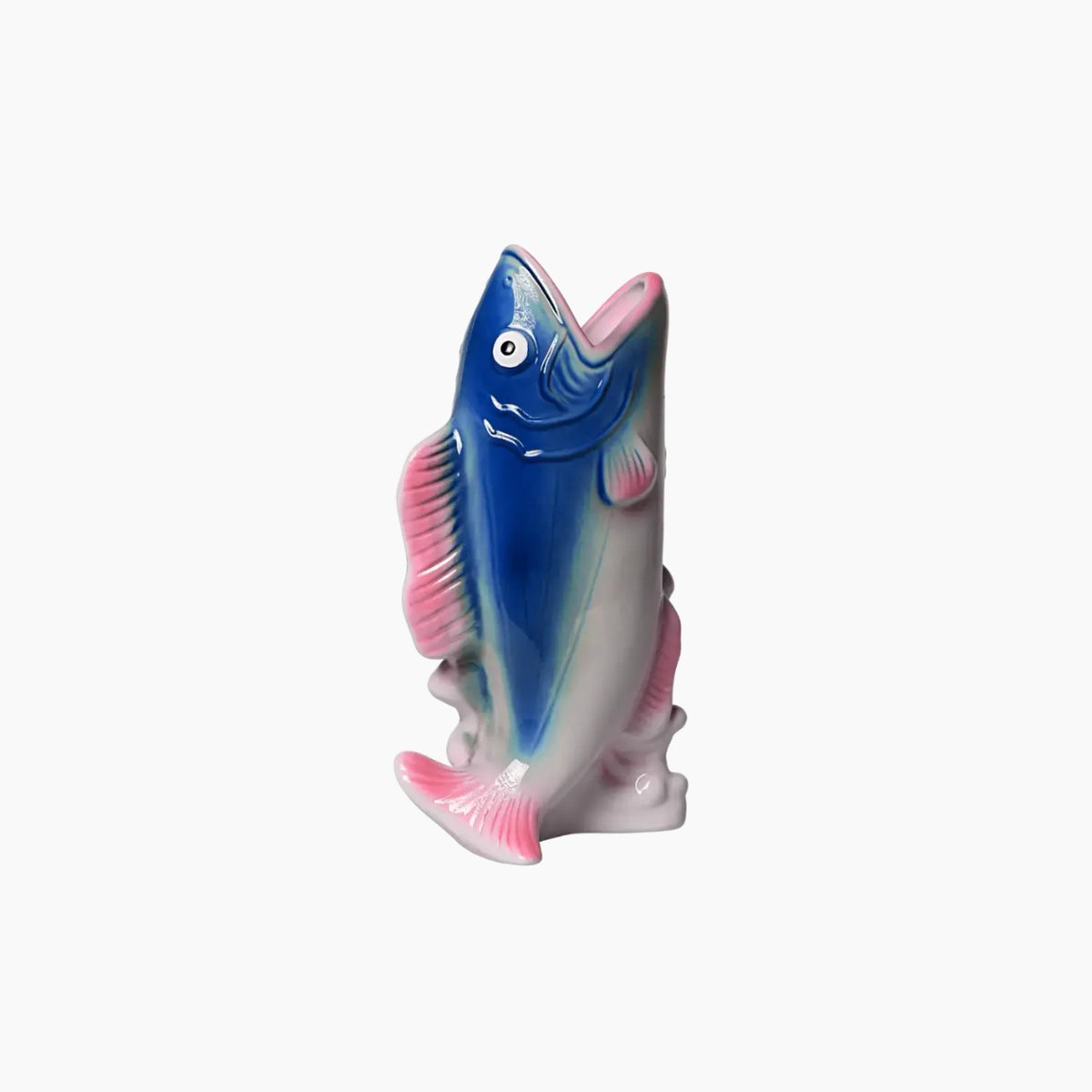 Colorful fish-shaped object on a white background