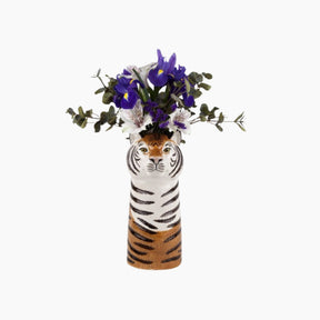 Tiger-shaped vase with flowers 