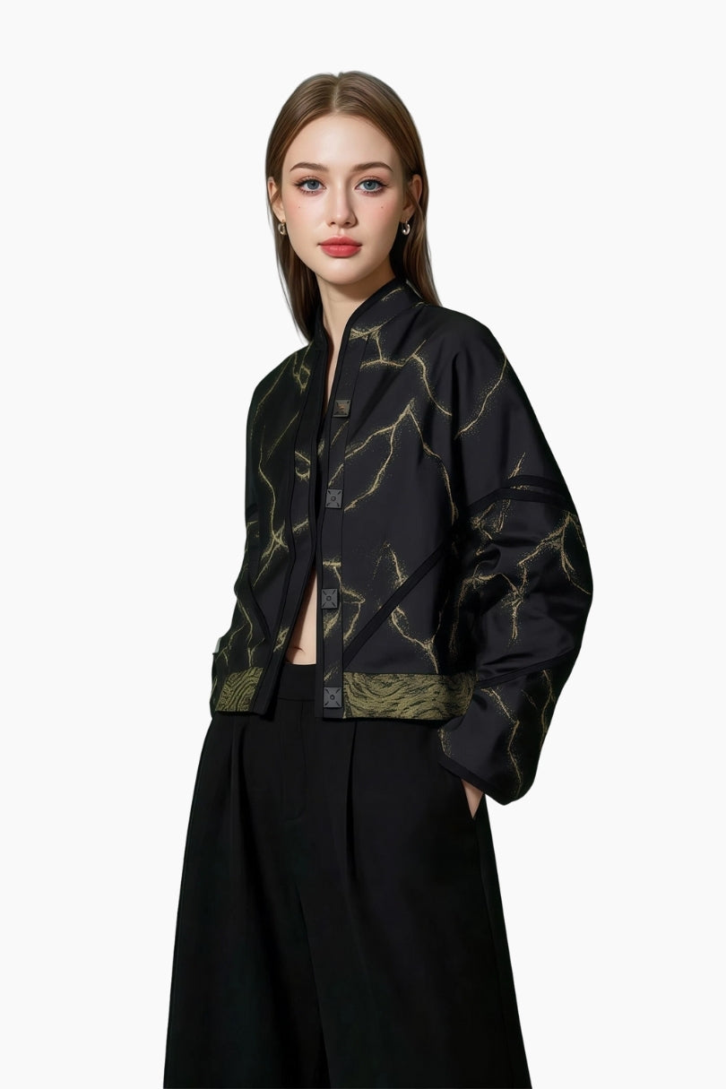 Woman wearing a Dark green patterned bomber jacket
