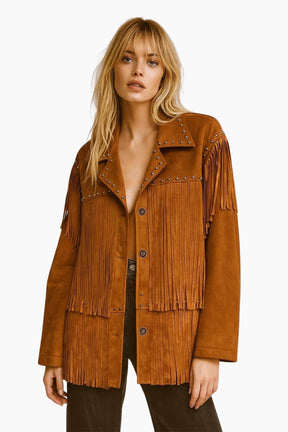 Woman wearing a brown suede jacket with fringes