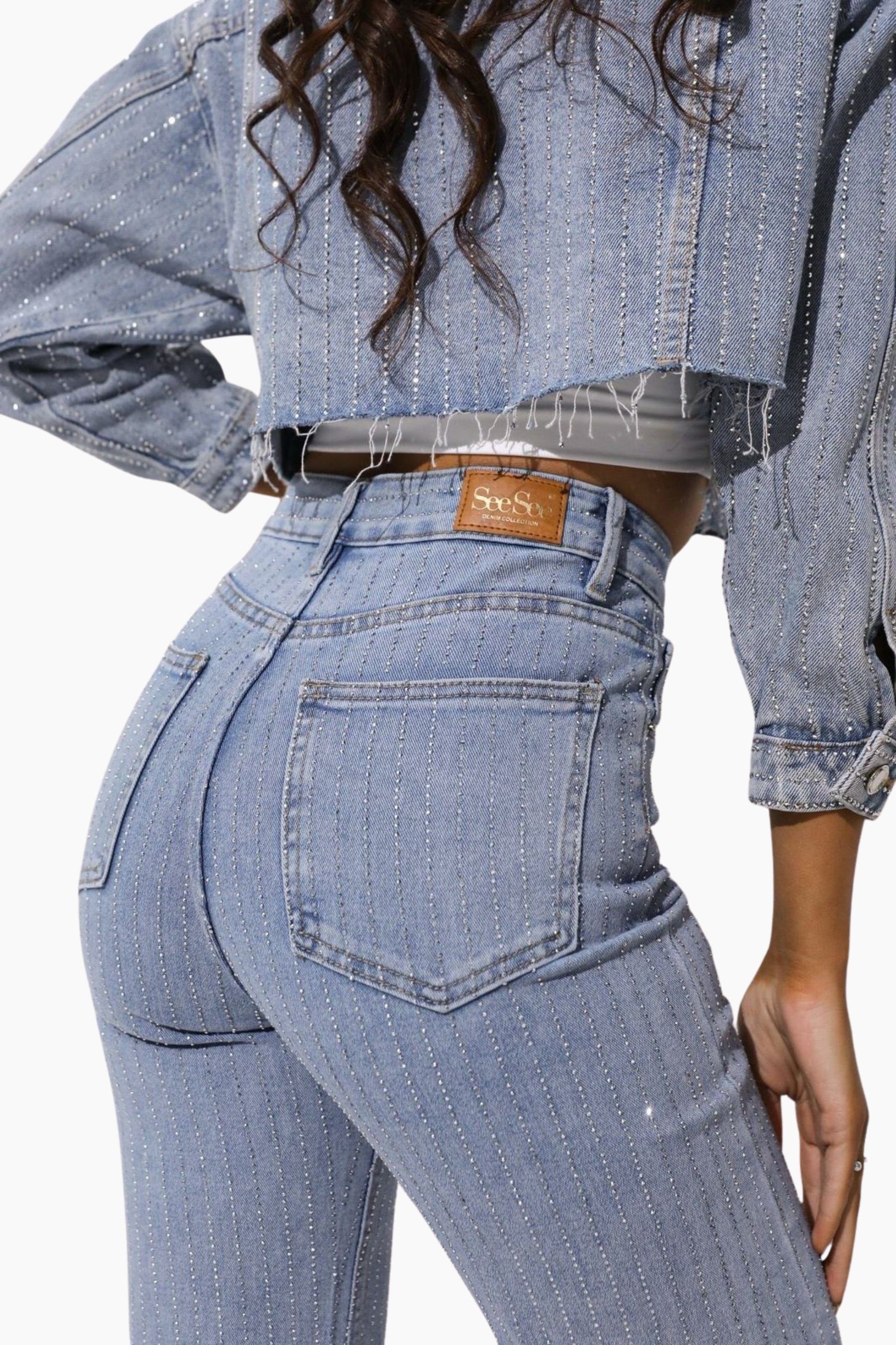 Person wearing light blue jeans 