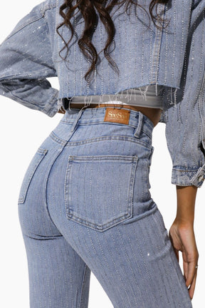 Person wearing light blue jeans 