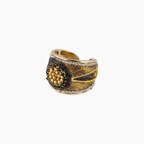 Gold and black ring 