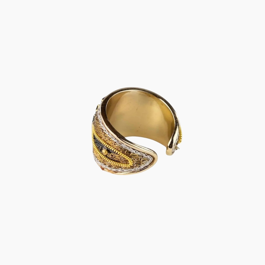 Gold ring with intricate design 