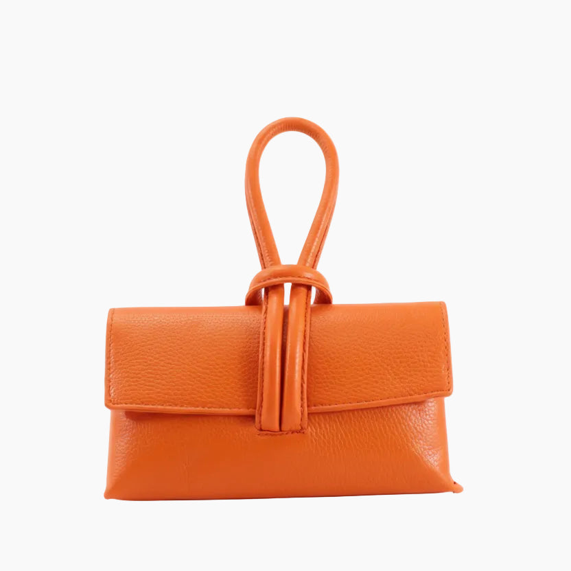 Brown leather handbag with a strap 