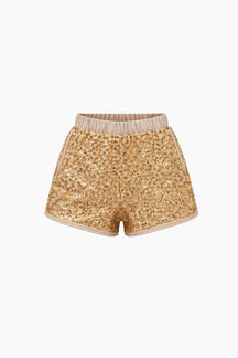 Gold sequin shorts on a white background