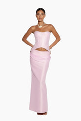 Woman wearing a Pink strapless corset and skirt