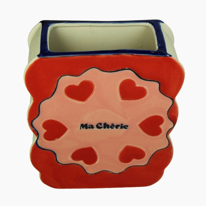 Ceramic planter with heart design and 'Ma Chérie' text 